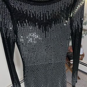 Black dress with rhinestones.
